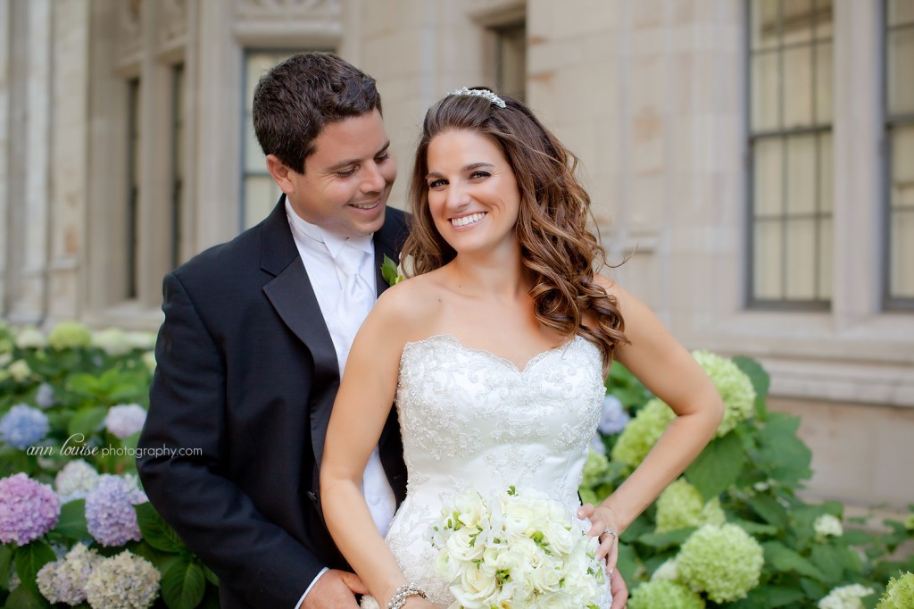 Wedding picture of groom looking at bride. Ann Louise Photography