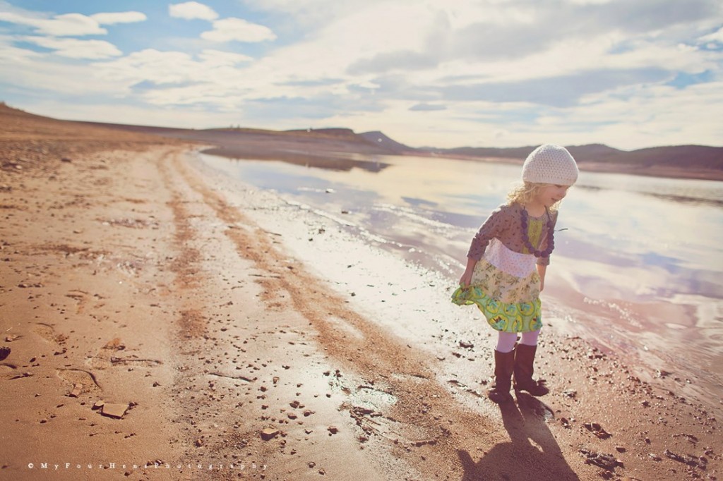 Portrait of little girl playing in sand by My Four Hens Photography
