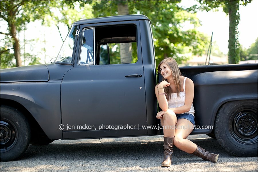 Senior portrait of girl posing with old truck by Jen Mcken