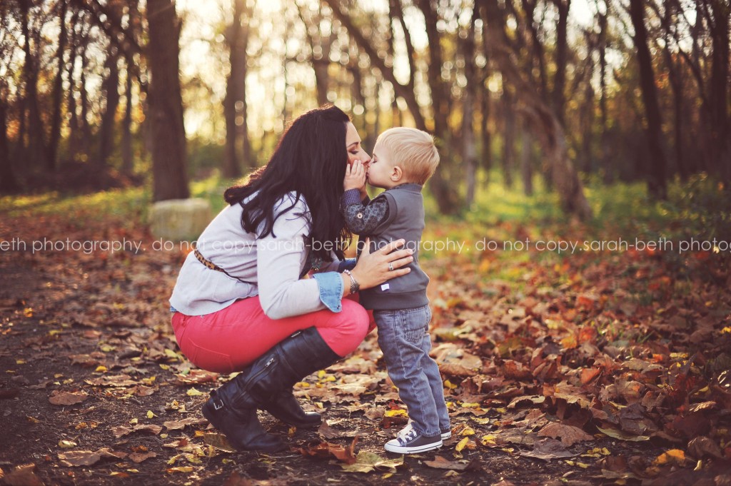 Portrait of toddler kissing his mom by Sarah-Beth Photography