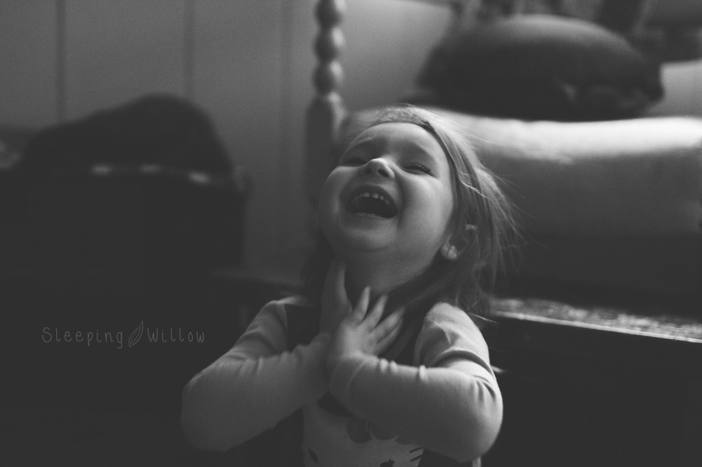 Little girl laughing by The Sleeping Willow