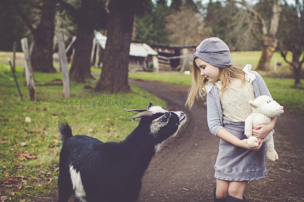 little girl with goat by The Sleeping Willow