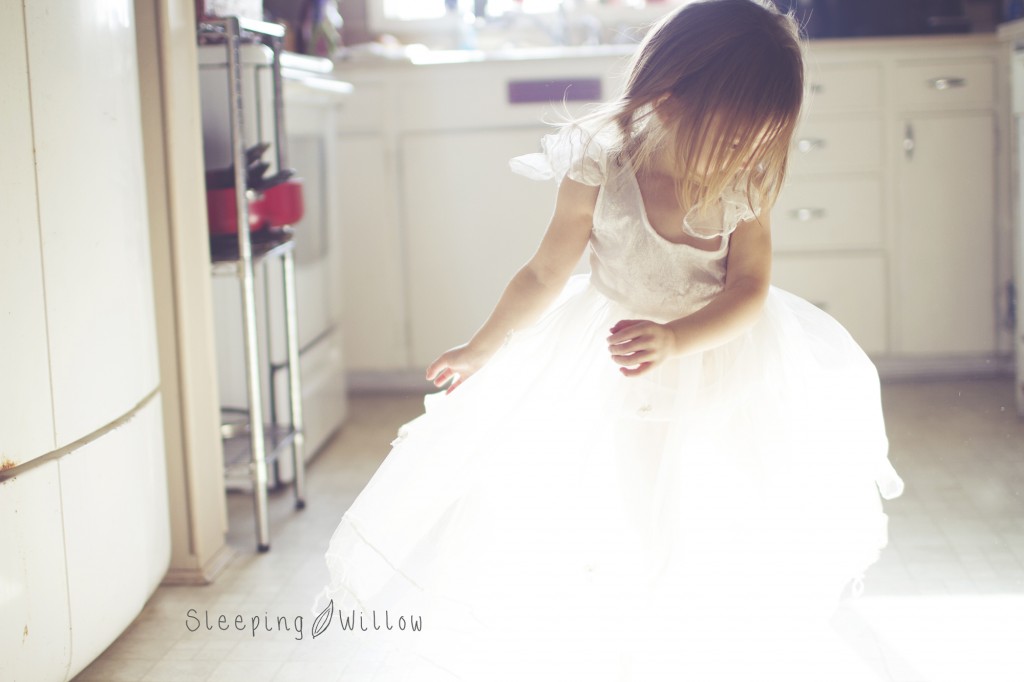 Little girl dancing by The Sleeping Willow