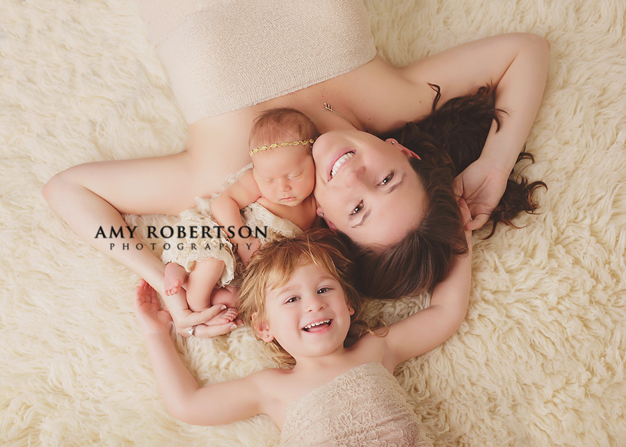 Portrait of newborn with sibling and mom by Amy Robertson Photography