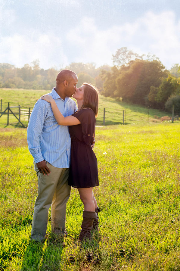 Portrait of Couple kissing outside by Kelly Broyles Photography