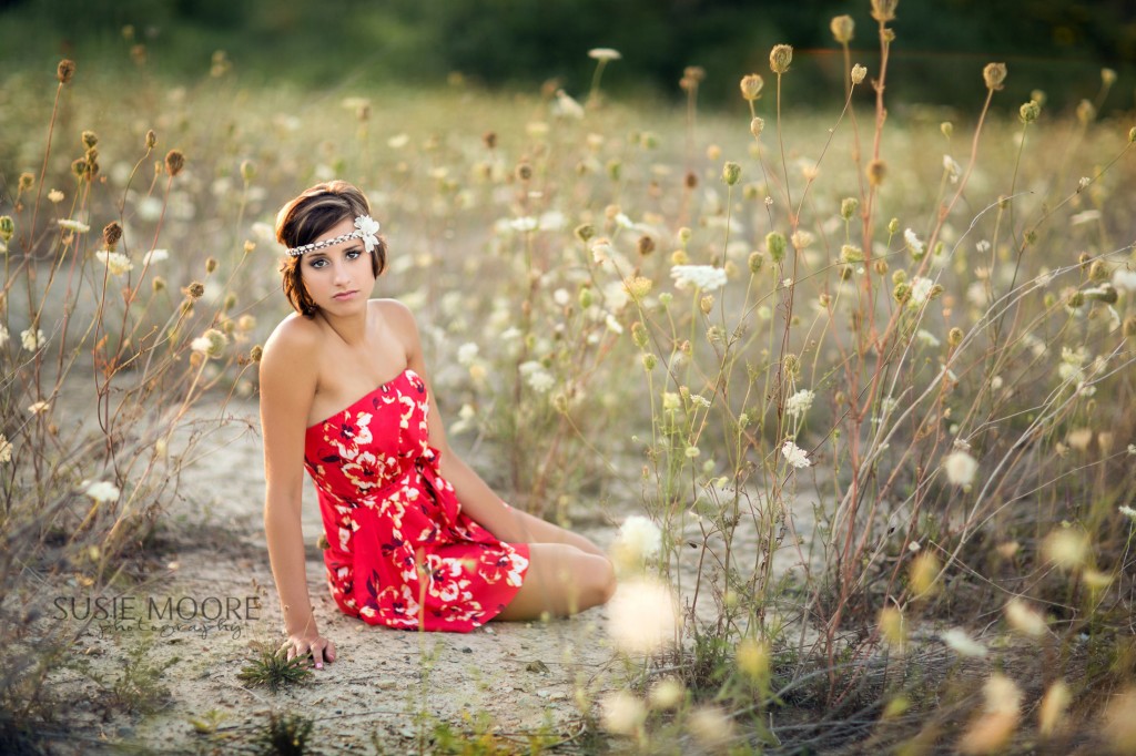 Portrait of Senior Girl Posing on Ground by Susie Moore Photography