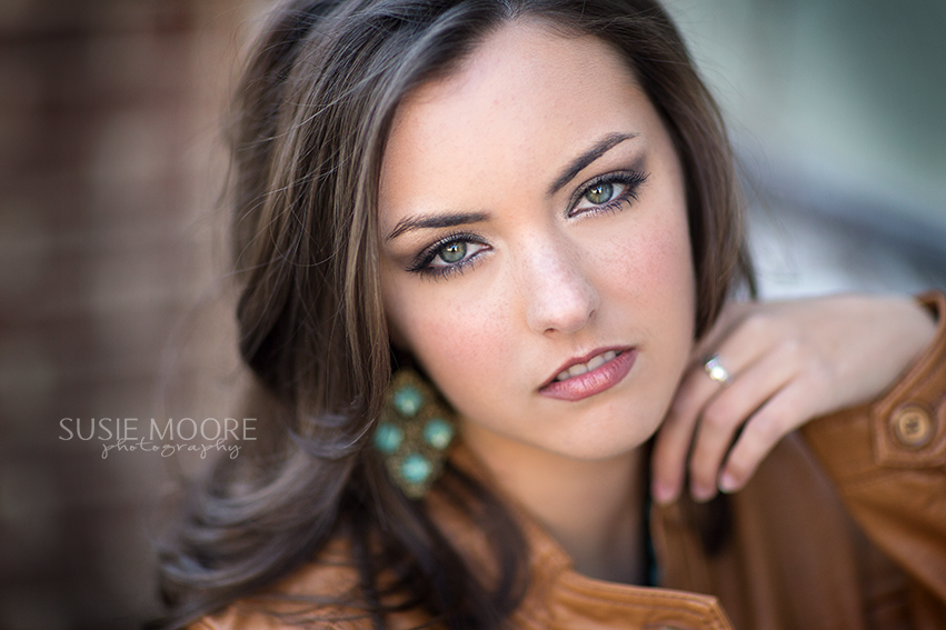 Portrait of Senior Girl Posing With Hand on Chin by Susie Moore Photography