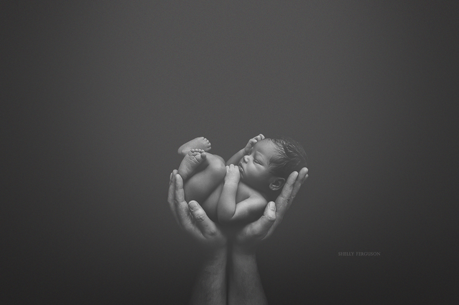 Artistic black and white newborn photography