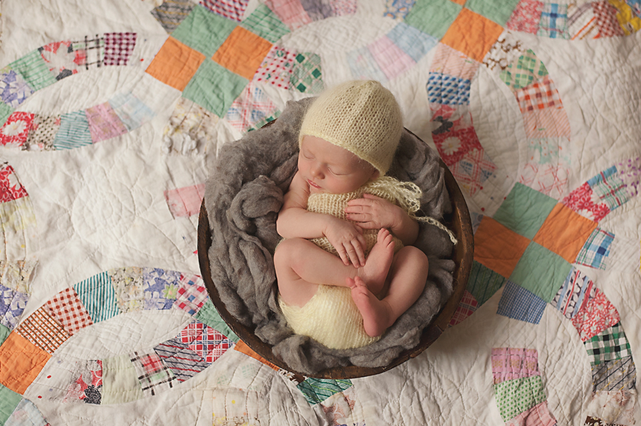 Baby in bowl with vintage quilt as floor drop. If you look back at my session plan for this little nugget, you will see this exact set-up written down. Nikon D700, 50mm, f2.5, 1/250 